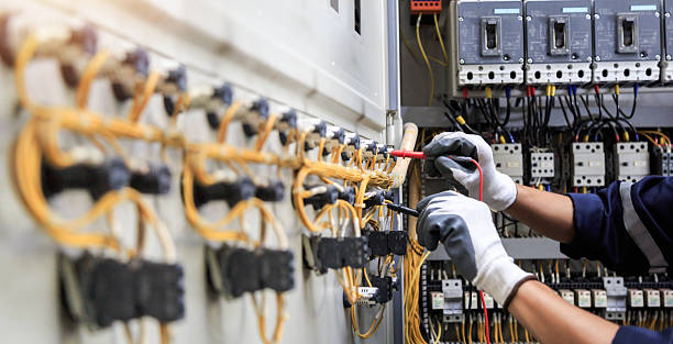 Professional Electrician technician working in Lawrence, KS